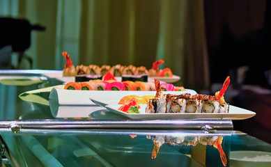 Wall Mural - Sushi Rolls on Counter of a Japanese Restaurant.