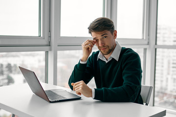 businessman working on laptop in office