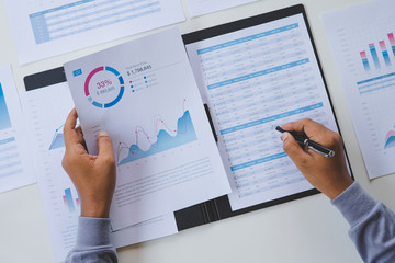 Poster - businessman working calculate data document graph chart report marketing research development  planning management strategy analysis financial accounting. Business office concept.