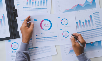 Poster - businessman working calculate data document graph chart report marketing research development planni