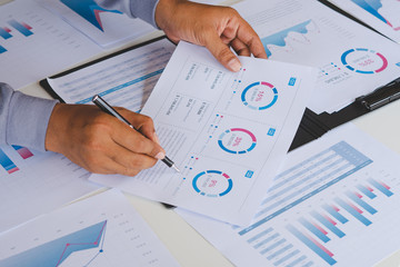 Poster - businessman working calculate data document graph chart report marketing research development planni