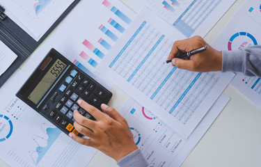 Poster - businessman working calculate data document graph chart report marketing research development planni