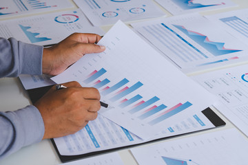 Poster - businessman working calculate data document graph chart report marketing research development planni