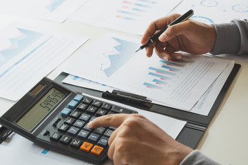 Poster - businessman working calculate data document graph chart report marketing research development planni