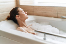 Young Woman In Bubble Bath