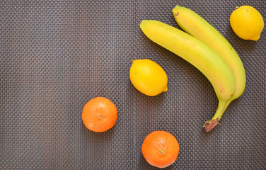 Seasonal fruits and berries: banana and citrus