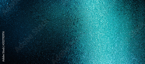 Blue color water drops on wet glass. Abstract texture background. Tableau sur Toile