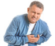 Mature man suffering from heart attack on white background