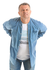 Poster - Mature man suffering from back pain on white background