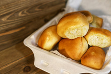 A Close Up Image Of Takeout Dinner Rolls