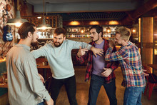 Drunk People Are Fighting In A Pub.