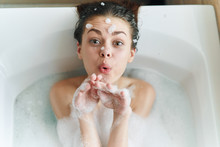 Girl In Bath With Foam