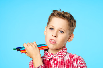 little boy with pencil