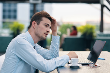 Poster - businessman working on laptop in office