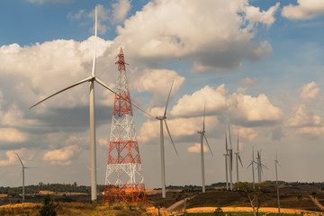 Wall Mural - wind turbine on hill. energy power in nature. eco concept