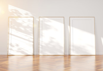 Aufkleber - Three wooden frame leaning in wooden interior mockup 3D rendering