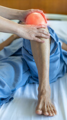 Knee injury and joint pain in elderly patient under doctor surgical medical exam, physiotherapy and treatment from osteoporosis, bone disease or leg joint surgery