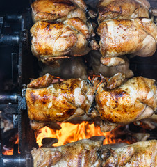 Wall Mural - Whole Chickens Roasting on Open Flame