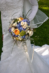 Wall Mural - bride holding wedding bouquet