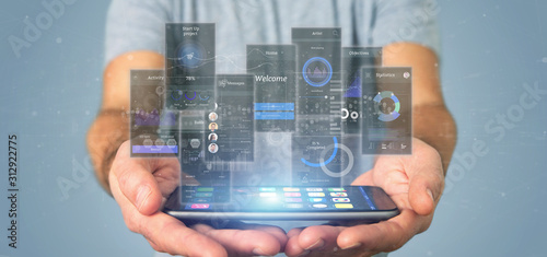 Fotografía Businessman holding User interface screens with icon, stats and data 3d renderin
