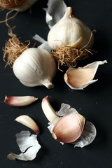 garlic, organic natural garlic on a black background