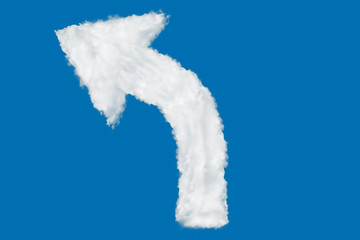 Wall Mural - Left turn arrow made of clouds on blue background