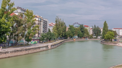 Wall Mural - Vienna cityscape with the Danube channel timelapse in Vienna. Austria.