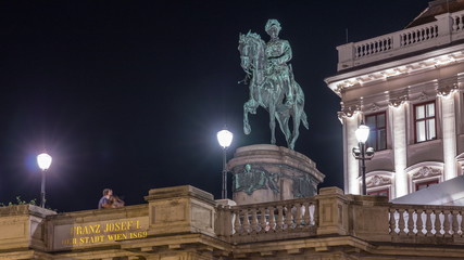 Canvas Print - Night view of equestrian statue of Archduke Albert in front of the Albertina Museum timelapse in Vienna, Austria