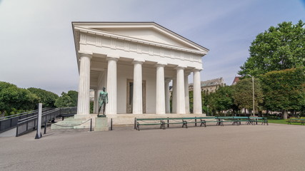 Sticker - View of the temple Theseus timelapse hyperlapse and historic park Volksgarten with its old rosarium in Vienna in Austria