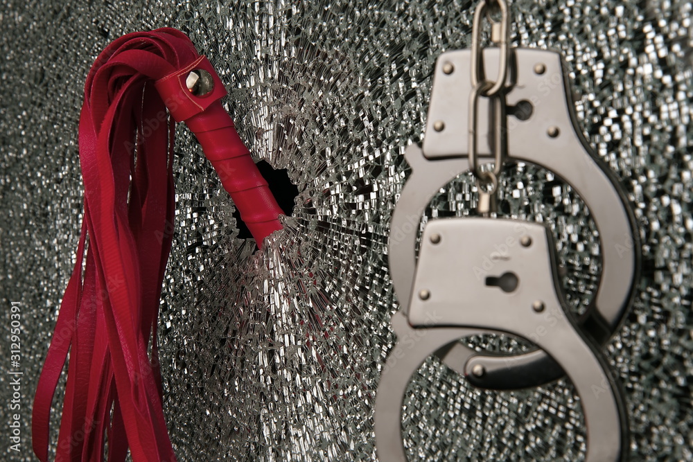 BDSM,sexual toys,broken glass and handcuffs .Adult sex games lifestyle