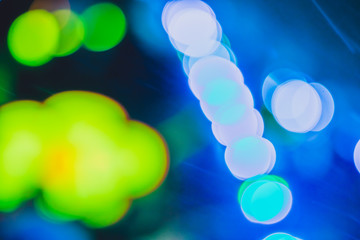 abstract bright blured colored bokeh. lights of the night city background.