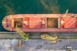 © EdVal - Top view from drone of a large ship loading grain for export. Water transport