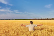 © Ryzhkov Oleksandr - Farmer walking through a golden wheat field