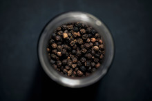 View From Above Black Peppercorns In Spice Jar