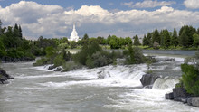 Waterfall And Mormon Temple At Idaho Falls