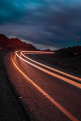 highway long exposure vehicle light trails curvy highway between mountains eilat israel