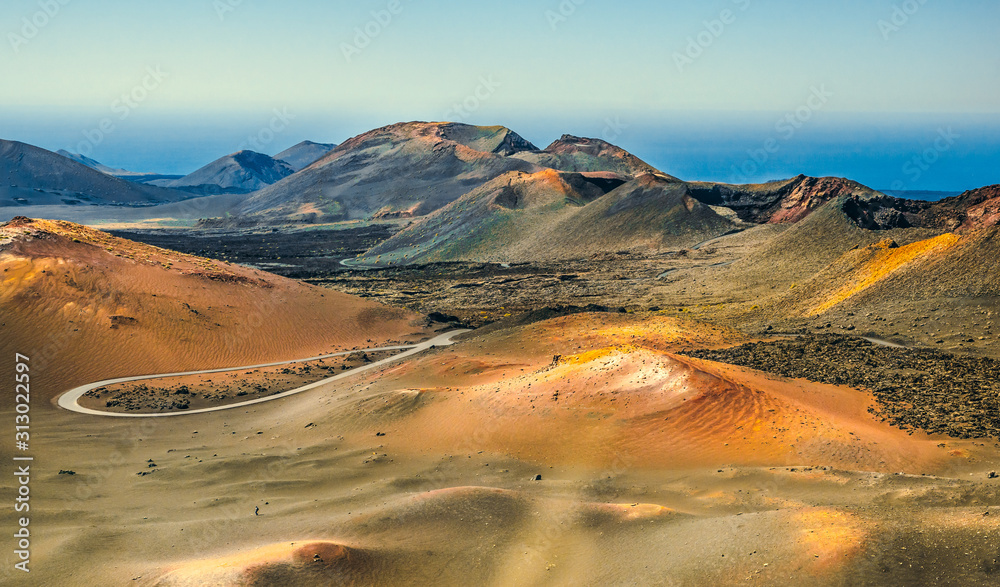 beautiful postcard view of Montanas del fuego in Timanfaya National Park, Lanzarote, Canary Islands - obrazy, fototapety, plakaty 