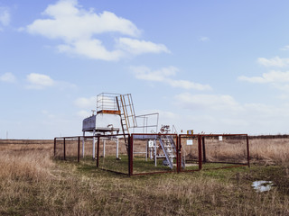 Wall Mural - Equipment of an oil well. Shutoff valves and service equipment