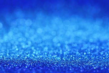 Blue glitter background with light blue shining bokeh.panton 2020 classic blue.classic blue swatch for print, web design