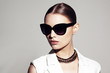 fashion portrait of beautiful model with sunglasses 