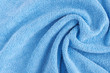 Wrinkled blue microfiber cloth texture of microfiber towel closeup