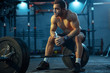 © master1305 - Caucasian man practicing in weightlifting in gym. Caucasian male sportive model posing before training, looks confident and strong. Body building, healthy lifestyle, movement, activity, action concept
