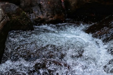 water flowing over rocks