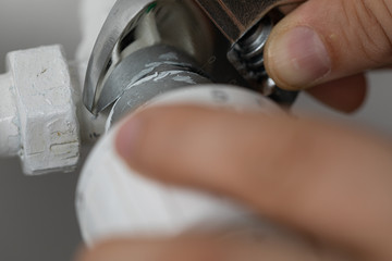 Poster - heater repair hand on white wall
