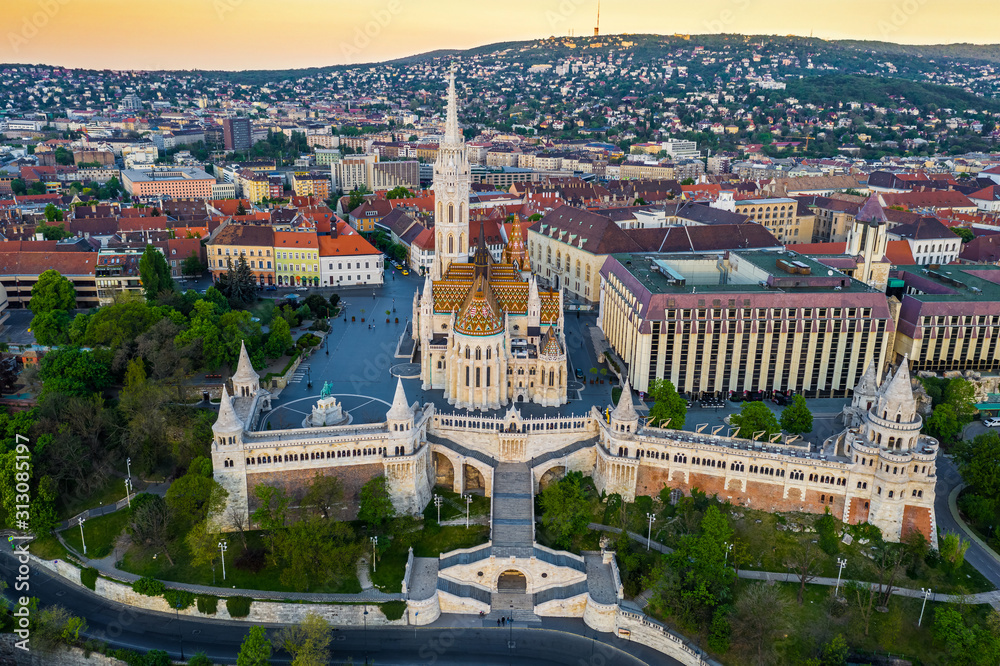 Budapest, Hungary - Aerial drone view of the famous Fisherman's Bastion (Halaszbastya) and Matthias Church on a summer morning - obrazy, fototapety, plakaty 