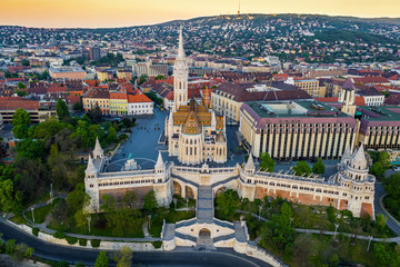 Wall Mural - Budapest, Hungary - Aerial drone view of the famous Fisherman's Bastion (Halaszbastya) and Matthias Church on a summer morning