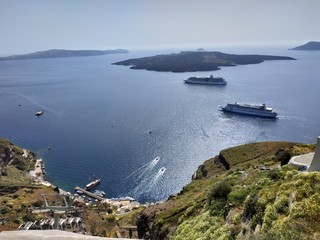 Santorini, Greece view on the cruise ships from top of the Thera city