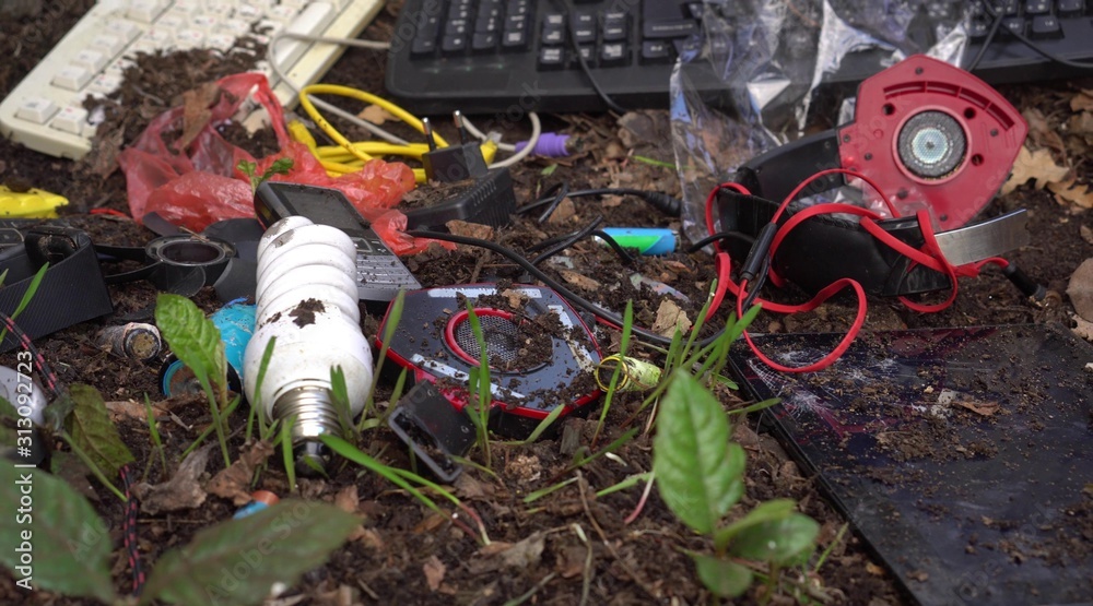 E-waste in a landfill. Electronic pollution The environmental concern. Electronic scrap components, such as CPUs, contain potentially harmful toxic components. Soil and water pollution by heavy metals
