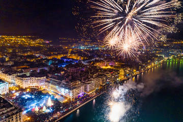 Aerial view of Aristotelous square in Thessaloniki during New Year celebrations with fantastic multi-colored fireworks