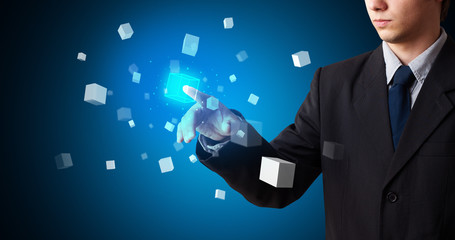 Aufkleber - Man touching hologram screen displaying cube symbols